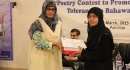Poetry Competition to Promote Peace and Tolerance in Bahawalpur - Hira Jalilis receiving her prize of first position from Prof Dr Zahid Hassan
